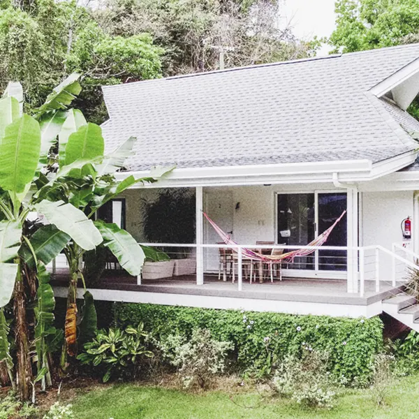 View of Aves Retreat Center pool and gardens in Montezuma Costa Rica trauma-informed yoga training